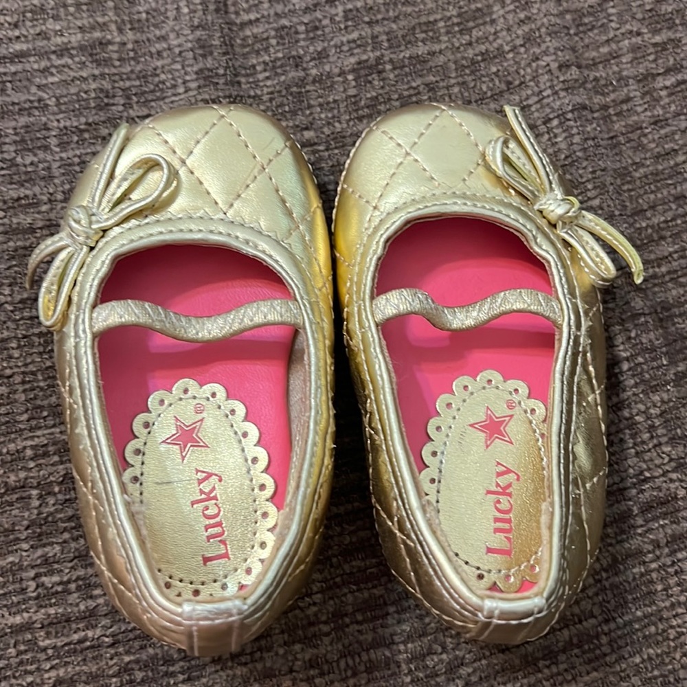 Gently used size 3 gold shoes. $5